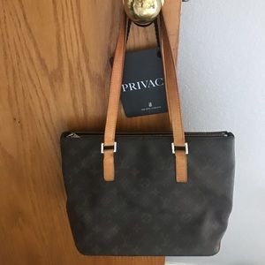 LOUIS VUITTON
Monogram Canvas Cabas Piano Tote Bag